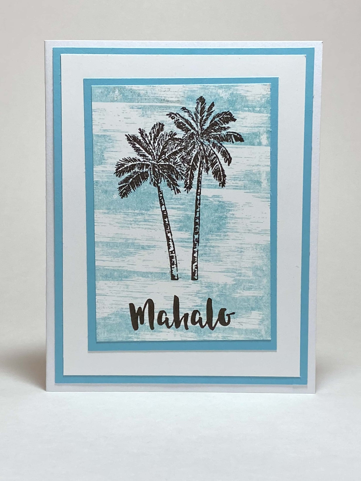 card-hawaiian-blue-background-palm-trees-mahalo